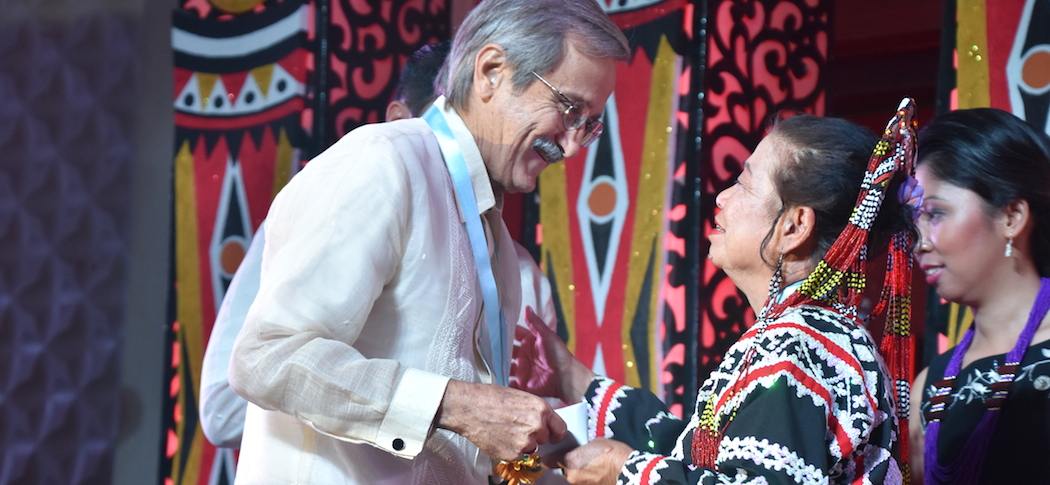 EXCEPTIONAL FILIPINOS. RAFI President Bobby Aboitiz awards retired teacher Anita Castillon of South Cotabato with the Ramon Aboitiz Award for Exemplary Individual.