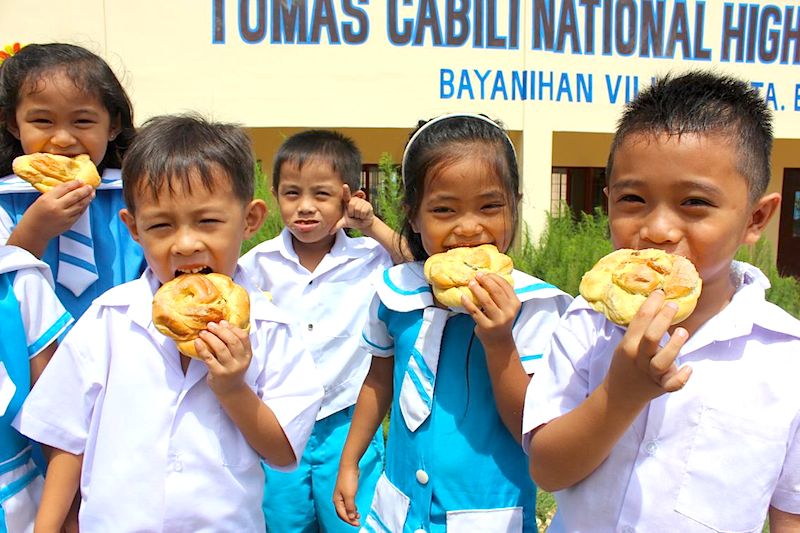 Tasty ensaymadas brighten recess for young, bubbly students of Tomas Cabili National High School – Annex in Sta. Elena, Iligan City.
