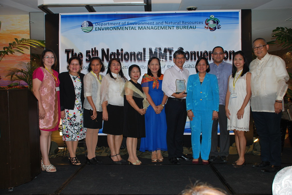 APRI VP-MakBan Facility Engr. Warren Maralit and APRI EHS‐Envi Supervisor Engr. Judyann Torres receive the award from the DENR Environmental Management Bureau.