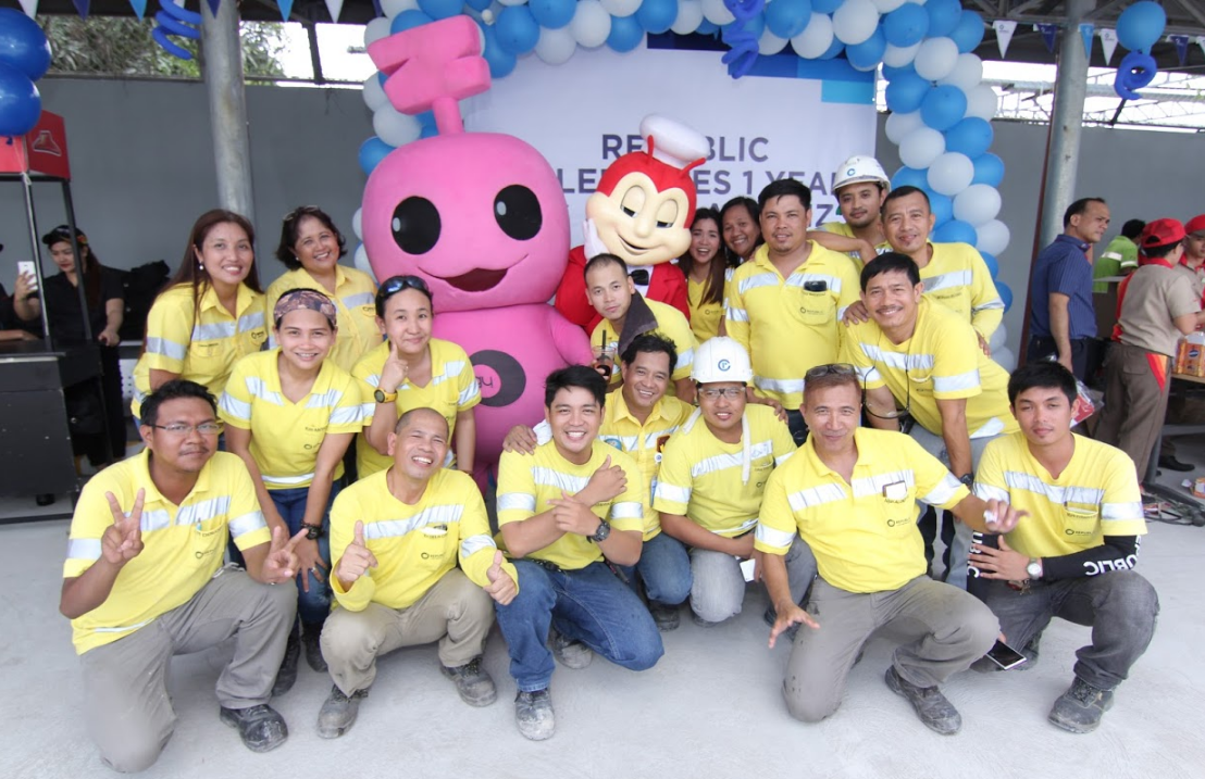 Kids at heart enjoy posing with the Mascots at Teresa Plant.